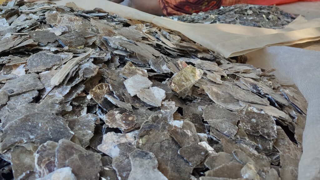 Pile of mica on a tarp at a sorting site in Madagascar 