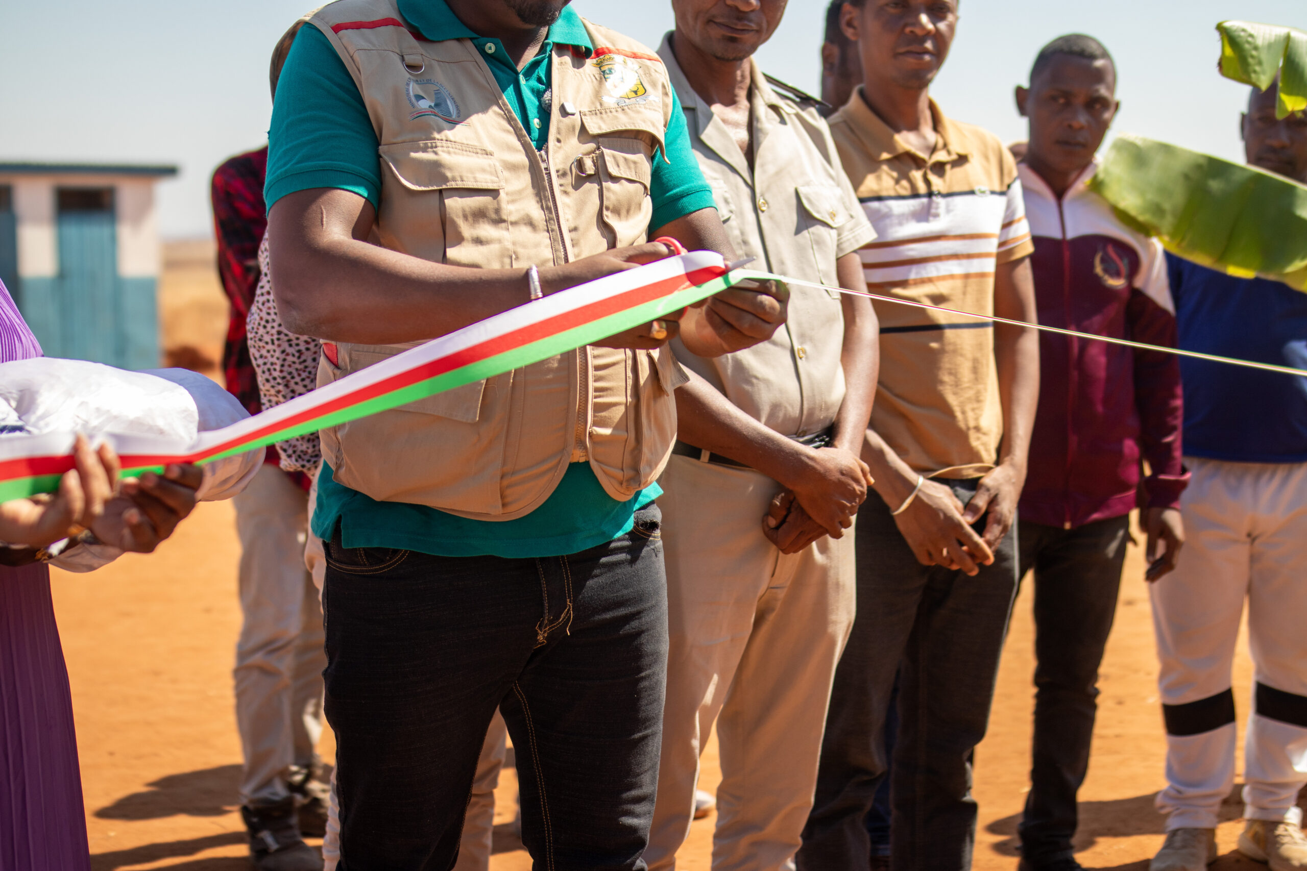 cutting the inauguration ribbon of the new school